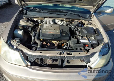 2001 Toyota Avalon Xls z USA, uszkodzony, nr VIN 4T1BF28B11U185075